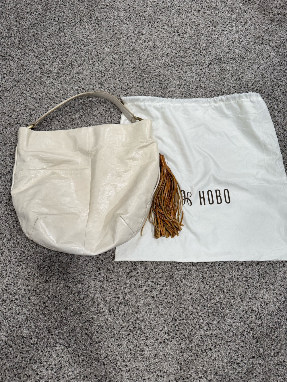 HOBO Cream Leather Hobo Bag with Brown Tassel